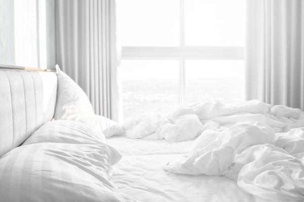 How to Keep Your House Cool in the Summer Without AC - Bedding and light furniture